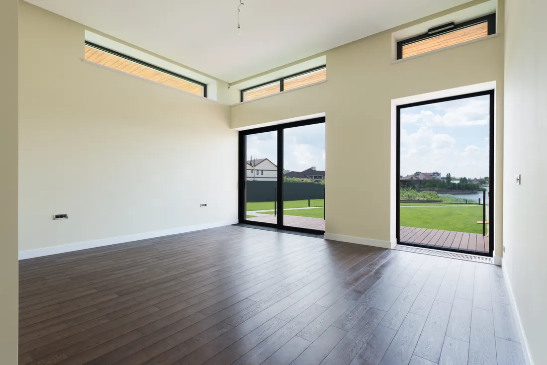 Room with new black-framed windows